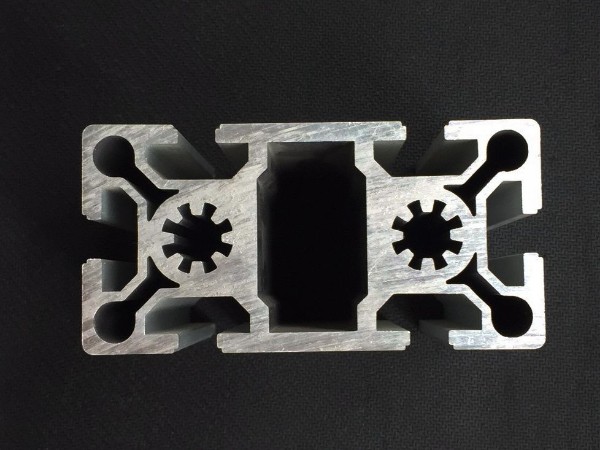 工業(yè)鋁型材截面大小與加壓機(jī)的關(guān)系